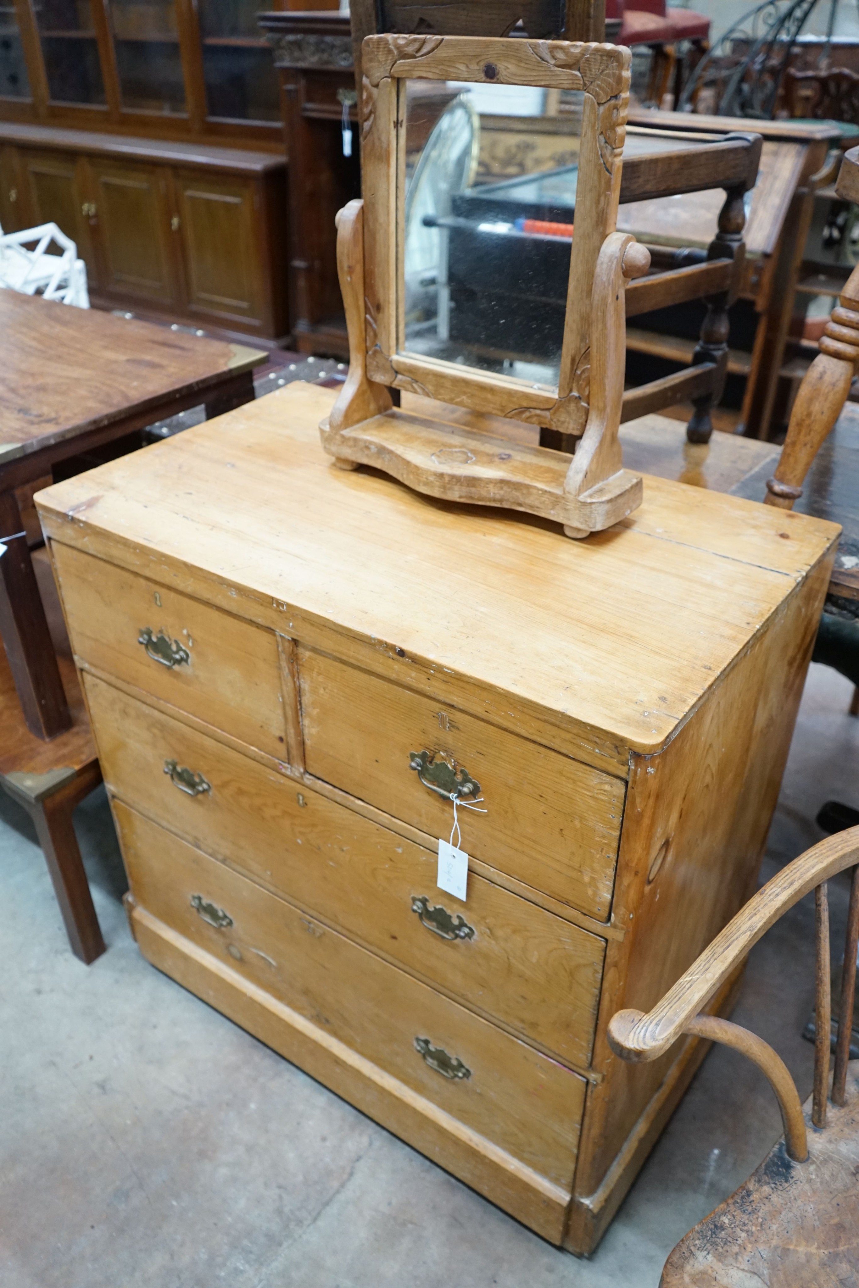 A Victorian stripped pine chest, width 82cm, depth 48cm, height 85cm and a toilet mirror